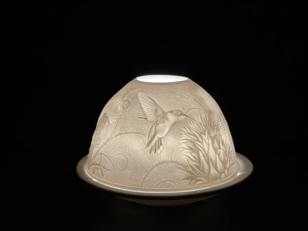 A white bowl with a bird on it