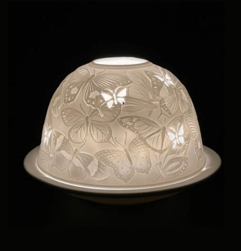 A white bowl with butterflies on it